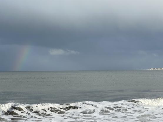 Rainbow off of Seacliff State Beach (CA) with Pleasure Point near Capitola in the distance.