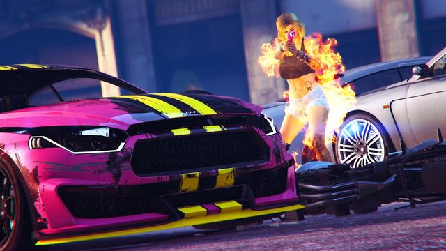 A screenshot I took in the video game GTA Online using the Rockstar Editor. It shows a random players female character on fire aiming at me with a flare gun to enlighten me. The random player is stepping out of the cover of two cars, one of them being my Obey 8F Drafter.