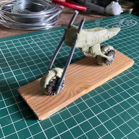 A crude model motorcycle armature made with Wire and Milliput.