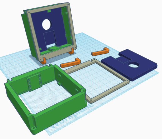Picture of TinkerCAD editing area showing all component parts laid out ready fro printing and an assembled vertical version to show how they go together