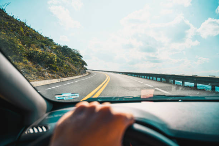 First person driver point of view driving down PCH