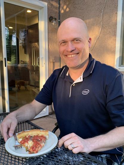 Preparing to eat an approximation of Chicago style pizza in California.
