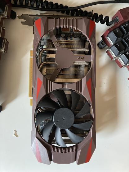 Two fan brown gpu with a missing fan