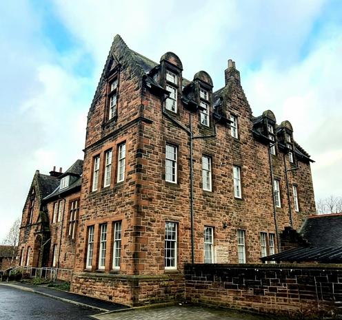 A late Victorian building designed in an earlier 17th Century Scottish style.
