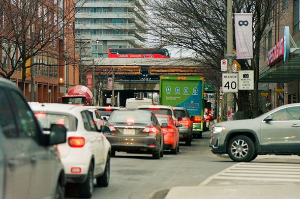 Typical daily traffic at the south end of Jarvis Street in Toronto, a city that forgot humans are supposed to live here.