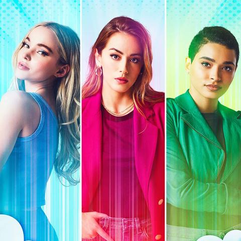 Photo compilation of Dove Cameron, Chloe Benett, and Yana Perrault dressed as their characters in CW's canceled "Powerpuff" show. From left to right, Dove Cameron appears as Bubbles, Chloe Benett as Blossom, and Yana Perrault as Buttercup. From top to bottom, Dove Cameron is wearing a blue tank top and blue denim bottoms; Chloe Bennet is wearing an unbuttoned hot pink blazer, maroon tee, and denim bottoms; and Yanna Perrault is wearing a tucked green blazer, a gray tee, and gray bottoms. This is a promotional image for CW's canceled "Powerpuff" show.