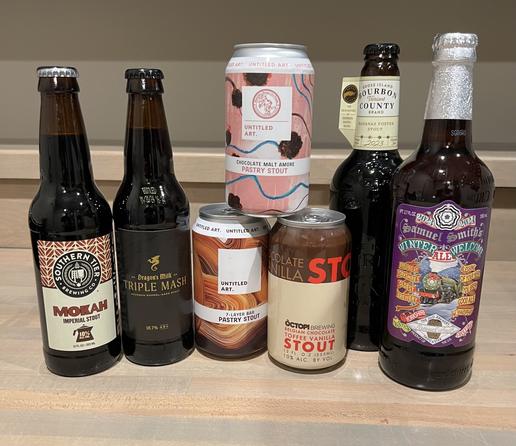 A collection of fine Stout beers from Southern Tier, Dragons Milk, Untitled Art, Octopi Brewing, Goose Island, and Samuel Smiths