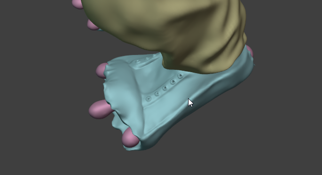 3d sculpture of a welsh rocker dragon, shoe detail
