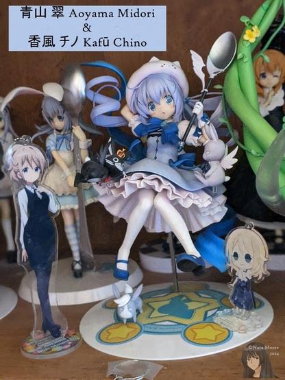 A Chino Fantasia figure stand with two Midori standees. In background you can see othe Chino and Cocoa figures.