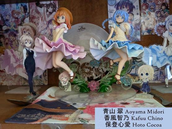 Cocoa and Chino figures and three Midori standees