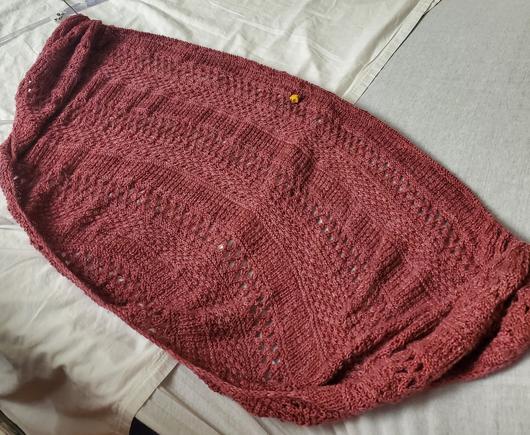 Another long shot of shawl on bed
