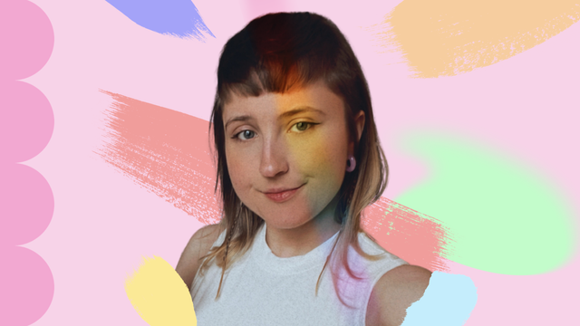 edited selfie of void, looking friendly into the camera. they wear a white top, purple loop earrings, black eyeliner, and their hair style is a modern mullet: it's shoulder long except for the top where it's shorter making it a fringe, and has shaved sides. the background is pink, with many different shapes in different colors.