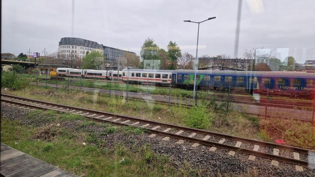 Pictures of multiple passenger carriages.
In the background the is an ICE-L