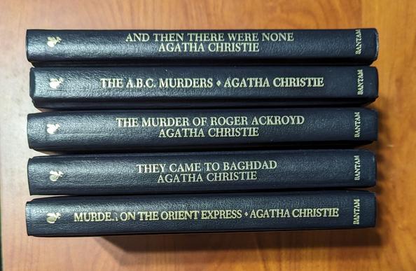 A set of 5 different Agatha Christie mysteries