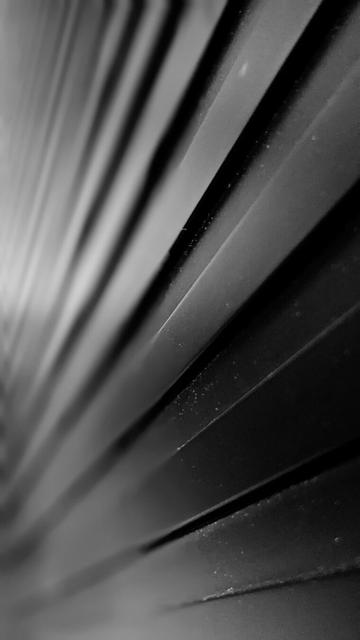 lineas de unos listones de madera, en diagonal.