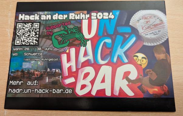 Postkarte von der Un-Hack-Bar mit Werbung für die Hack an der Ruhr 2024 in Schwerte