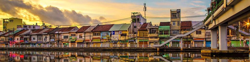 photo - waterfront housing on a coastal canal, Ho Chi Minh City, Vietnam