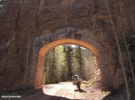 [as a geologist and an adventure rider – and a Colorado resident that loves history - I have travelled all over this area; this photo is mine, my motorcycle under the Apishapa Arch in Aguilar, Colorado, a 1930s Civilian Conservation Corps project through a volcanic dyke, ‘coincidentally’ providing better access to land that a senator had purchased up around Cuchara and Cordova Passes]