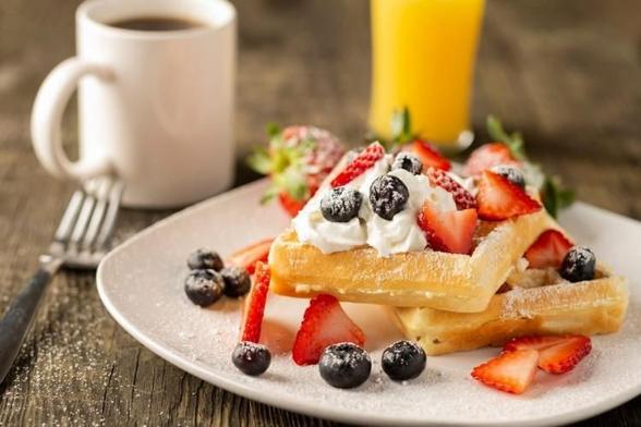 Belgian waffle breakfast, a less common type of breakfast.