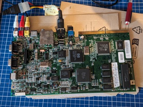 Photo from the top of an Amiga CD32 motherboard, recently recapped with a mix of ceramics and electrolytics