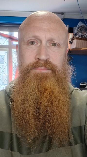 Me, not wearing any glasses. I look slightly quizzical for some reason. My beard is a proper, young-man's ginger. Clearly inappropriately well committed for my age.