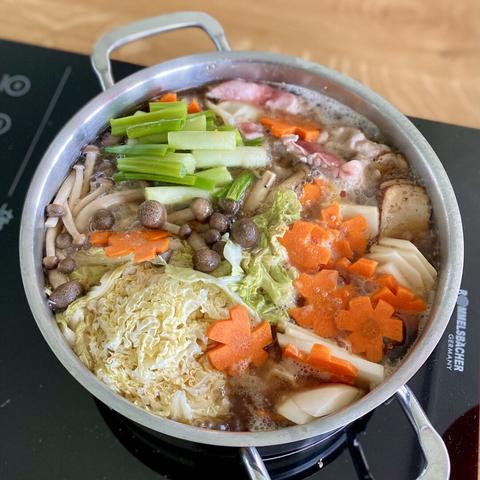 The hot pot freshly loaded with soup and other items as mentioned in the post.