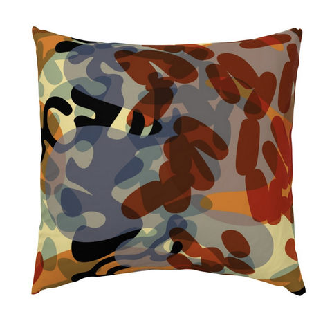 Mock-up of a square pillow on a white background. The pillow sham has a fabric pattern of abstract lozenge and squiggly shapes in a whirl of burgandy red, smokey blue, burnt black, orange, and pale yellow. The design name is Fire Plumes.