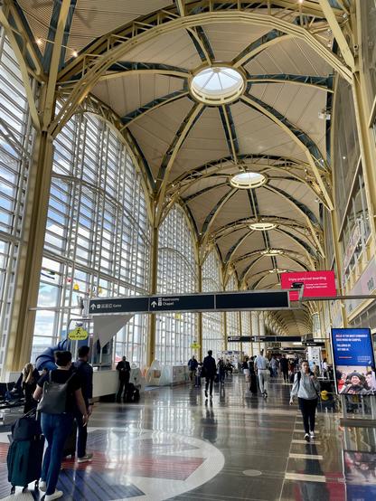 Interior of the National Airport terminal with tall ceilings and windows letting in lots of light