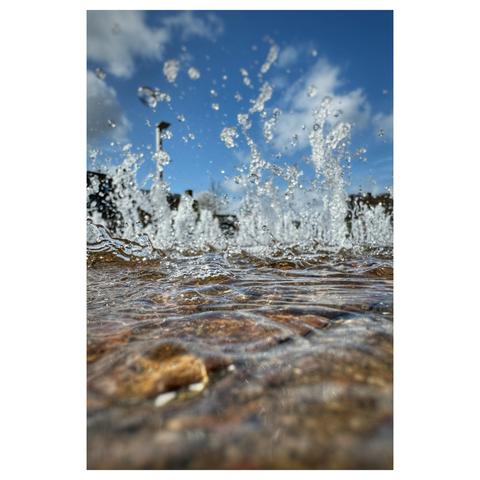 Close up low level photo of water fountains at Coal Drops Yard, King's Cross
