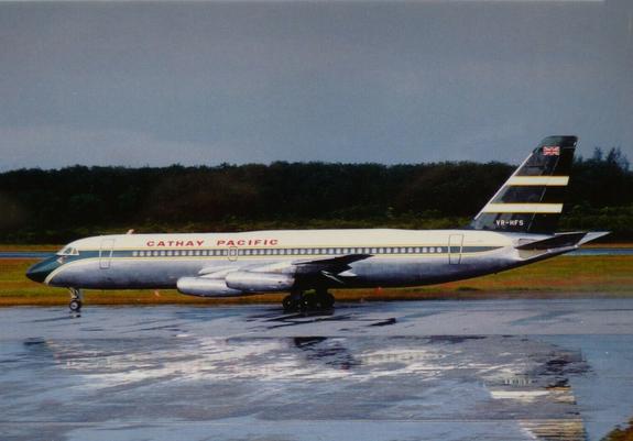 Older livery and taxiing out after the rain.