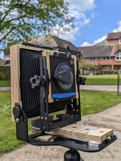 Photo of a 4x5 camera with pinhole lens holder
