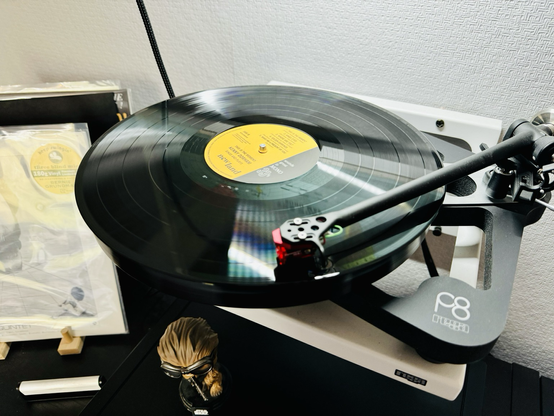 Photo of a record spinning on a turntable.