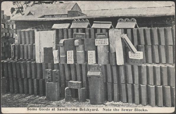 Printed monochrome postcard showing a selection of goods produced by the Sandholme Brickyard at Laxton near Howden by Goole in Yorkshire, and giving special mention to the sewer blocks.
Published by Sandholme Brickyard, Saltmarshe Estate, Laxton, near Howden, not numbered.
Postally used on 20 July 1905 with single circle Newport R.S.O. cancellation on green halfpenny stamp and sent to Mr F. Wildon, c/o Pearce, Browns, Auctioneers, Selby.
Good condition, with slight corner wear, but small very light crease to top right corner.
