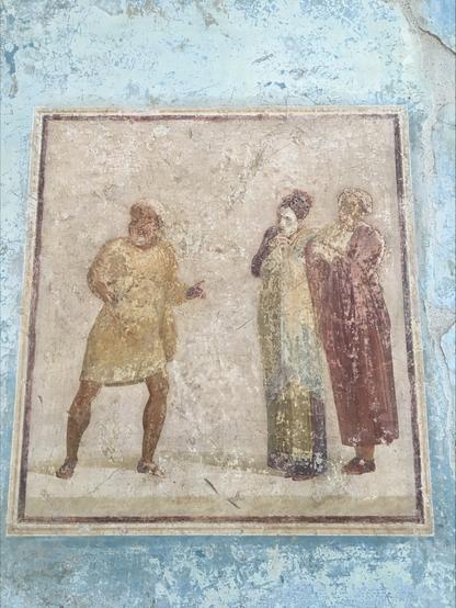 Painting on a wall appears to show a man pointing out something to two other people, who may be skeptical.