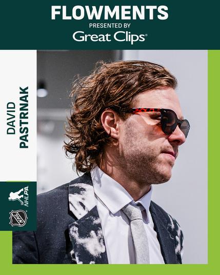 Top: White text on a dark green background reading, "Flowments presented by Great Clips".

Left: NHL and NHLPA logos followed by "David Pastrnak" in green text on a white background.

Middle: David Pastrnak arrives at a game in a grey-patterned suit, white shirt, silver tie, and sunglasses.