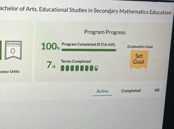 A picture of a computer screen showing 100% coursework completion