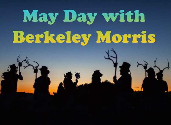 Silhouettes of morris dancers carrying antlers against a glowing pre-dawn sky