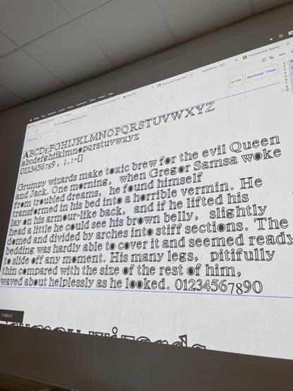 A photo of a projection of letters in the browser based plancton editor. It shows text in different sizes; some character overviews, and the beginning of The Metamorphosis by Kafka.