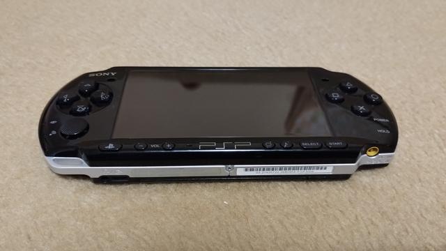 My PSP, looking really good with some very minor scratches almost unnoticeable.