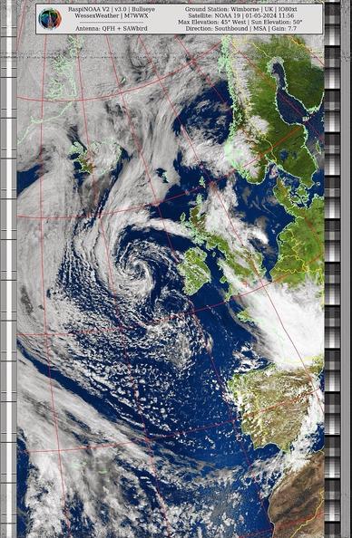 Satellite image showing cloud formations over the Atlantic with a large swirling pattern indicative of a cyclone, adjacent to western Europe's coastline. Overlay with geographical grid lines and side panel with technical data regarding satellite reception.