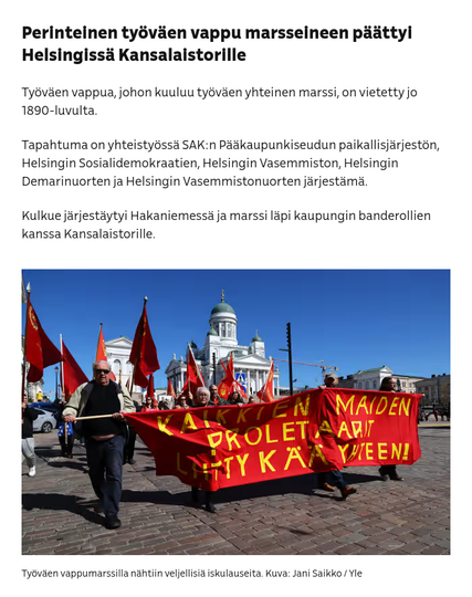 Kuvakaappaus Ylen Vappu-reportaasista. Tekstisisältö koostuu yleisestä työväen vappumarssin järjestäjäporukasta ja marssin kulusta. Kuvituskuvana on käytetty Senaatintorin laidalta otettua kuvaa, jossa näkyy isosti SKP:n marssilohkon pääbanneri, jossa lukee punaisella kankaalla isolla keltaisella tekstillä "kaikkien maiden proletaarit liittykää yhteen!" Banneria kantaa neljä ihmistä ja heidän takanaan kulkee yli kymmenen erilaista SKP:n erinäisten piirien ja osastojen lippua. Taustalla möllöttää Helsingin tuomiokirkko.