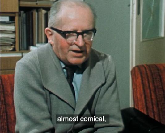 Marian Rejewski being interviewed about code breaking during the second world war, subtext saying 'almost comical'