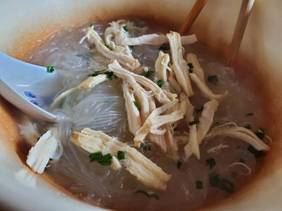 Bowl of rice vermicelli & chicken soup.