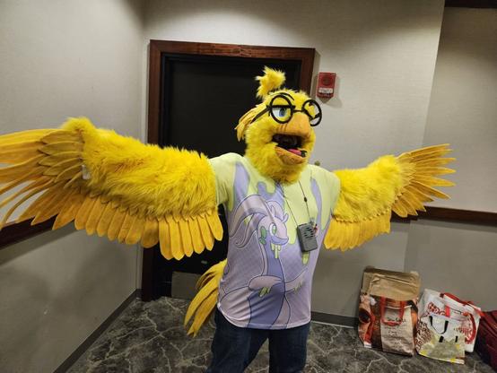 Fursuit photo 1: posing with my wings spread