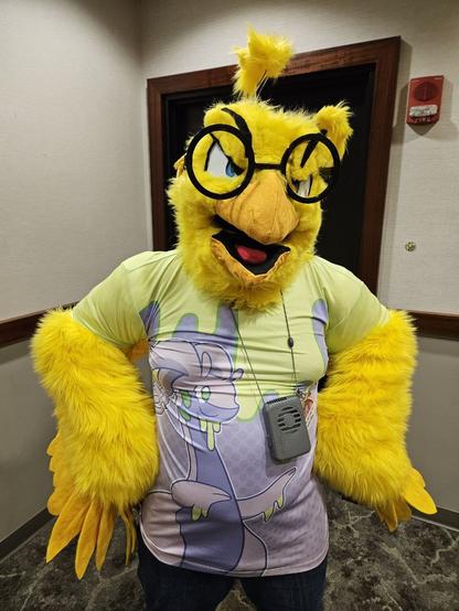 Fursuit photo 2: angry expression with wings at my hips