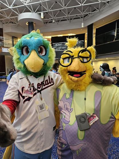 Fursuit photo 3: I’m making the Dreamworks Face™️ with another bird fursuiter