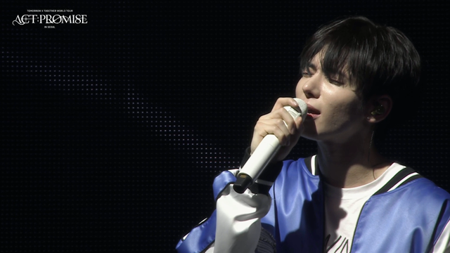 Taehyun onstage for Act: Promise, TomorrowXTogether