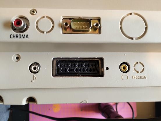rear view of the monitor. the placeholder region in the plastic case cut open and the SCART connector accessible
