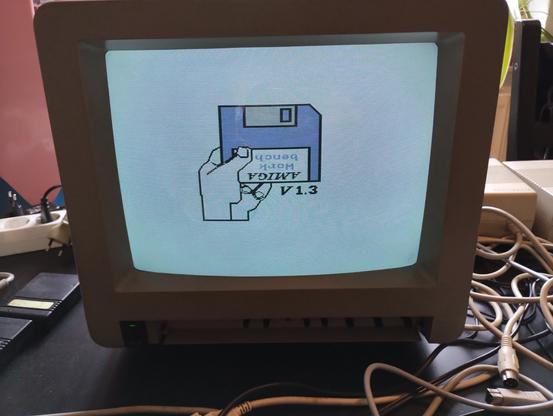 proof of concept using a SCART cable to my Atari 500. the monitor is displaying the AMIGA Workbench logo.