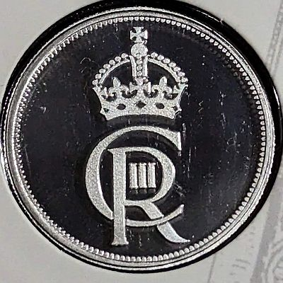 King Charles III Cypher - https://www.royal.uk/his-majesty-kings-cypher The cypher is the Sovereign’s monogram, consisting of the initials of the monarch’s name, Charles, and title, Rex – Latin for King, alongside a representation of the Crown.